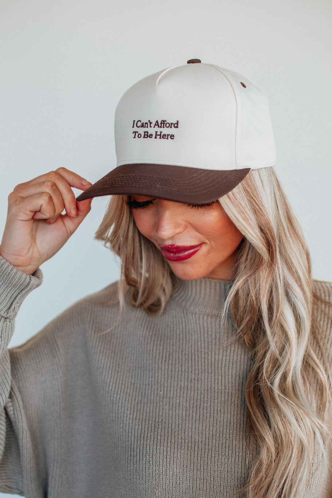 I Can't Afford To Be Here Trucker Hat