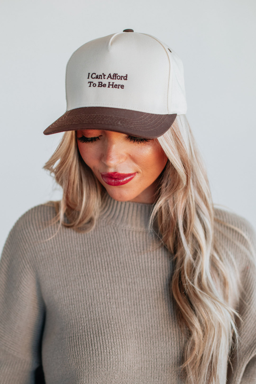 I Can't Afford To Be Here Trucker Hat